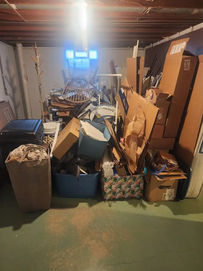 Roll-off dumpster container at job site for 2 Yard Dumpster Rental in Andrews AFB